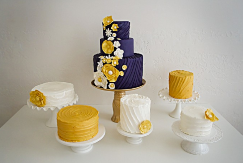  out this gorgeous navy blue and yellow wedding cake by Pink Peach Cakes